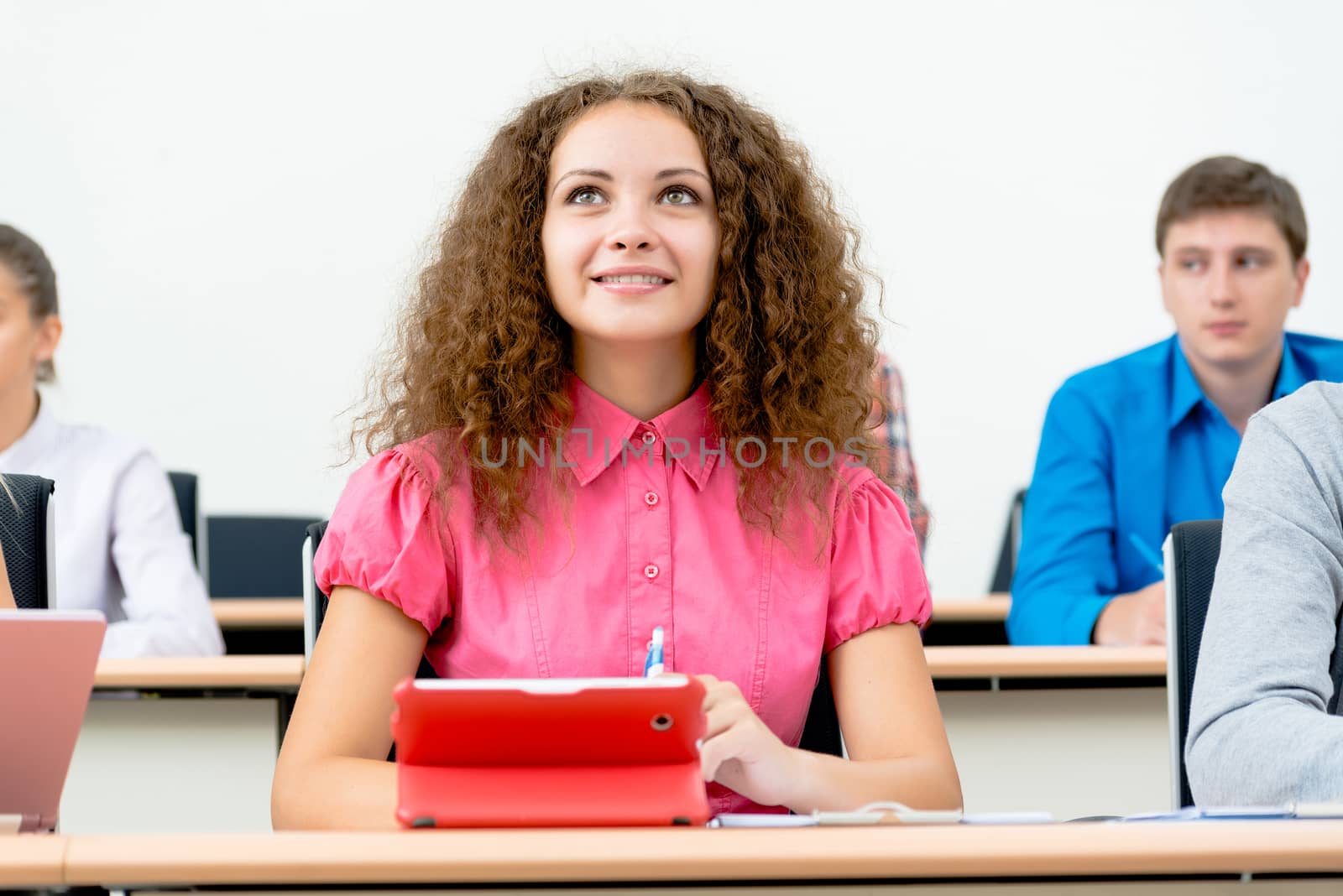 image of a young female student in the classroom, teaching at the University of