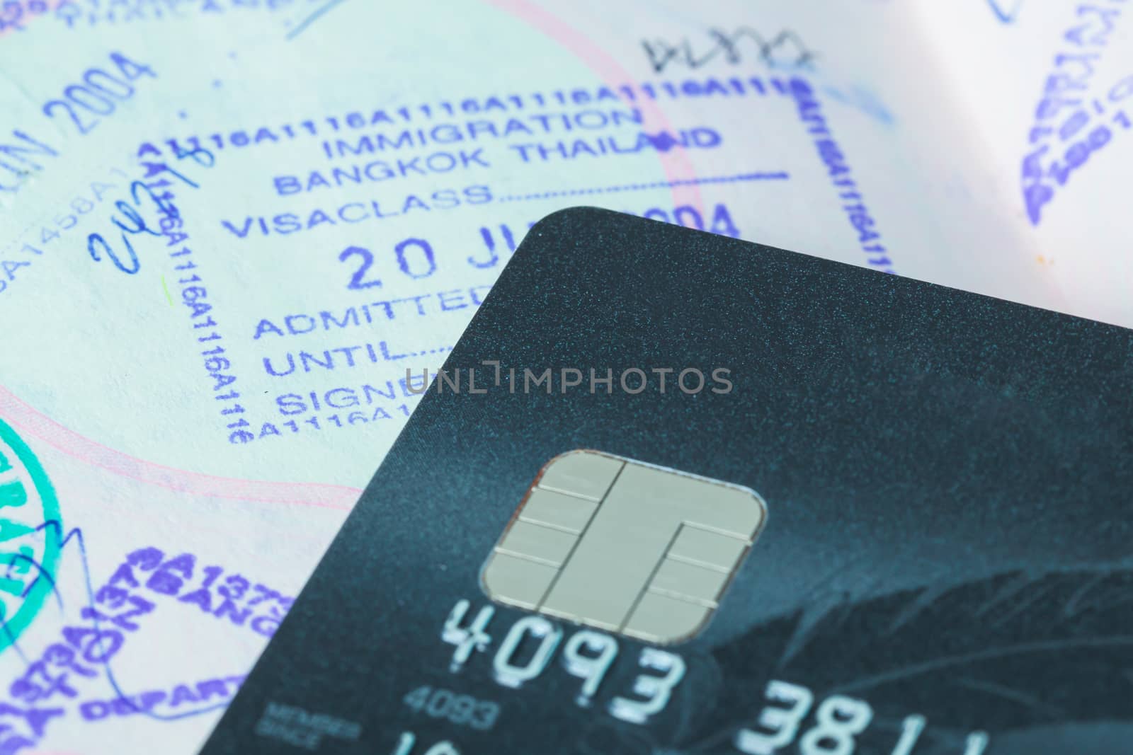 credit cards with sim and passport stamp for travel concept background