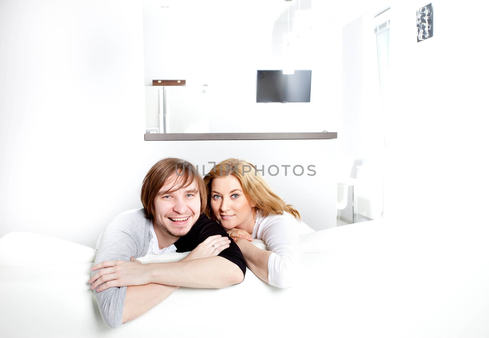Couple in new home by Astroid