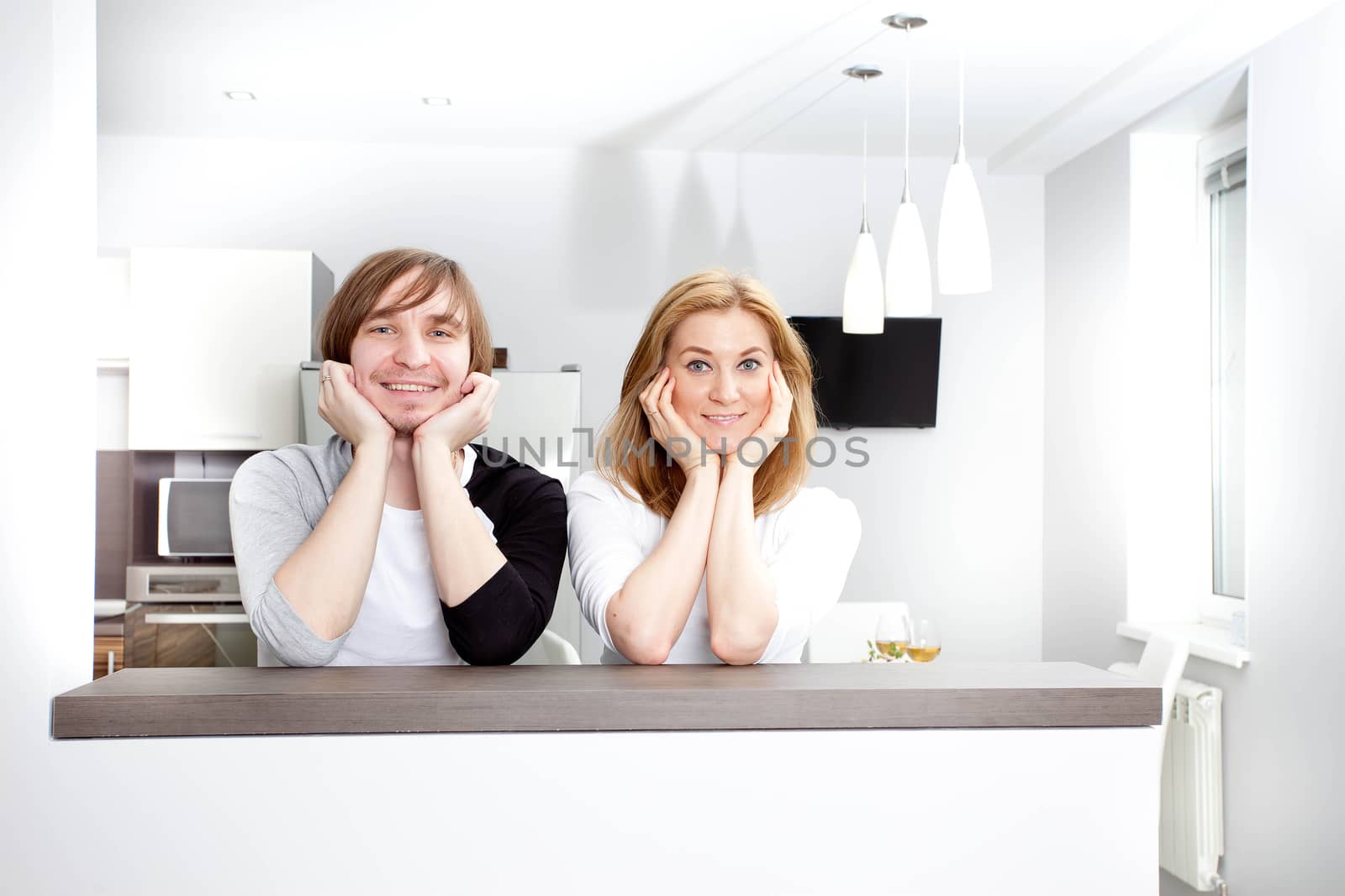 Smiling Couple  In New Home by Astroid