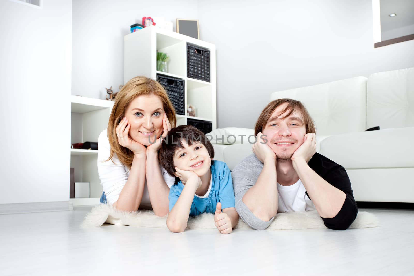 happy family in the interior of a new home
