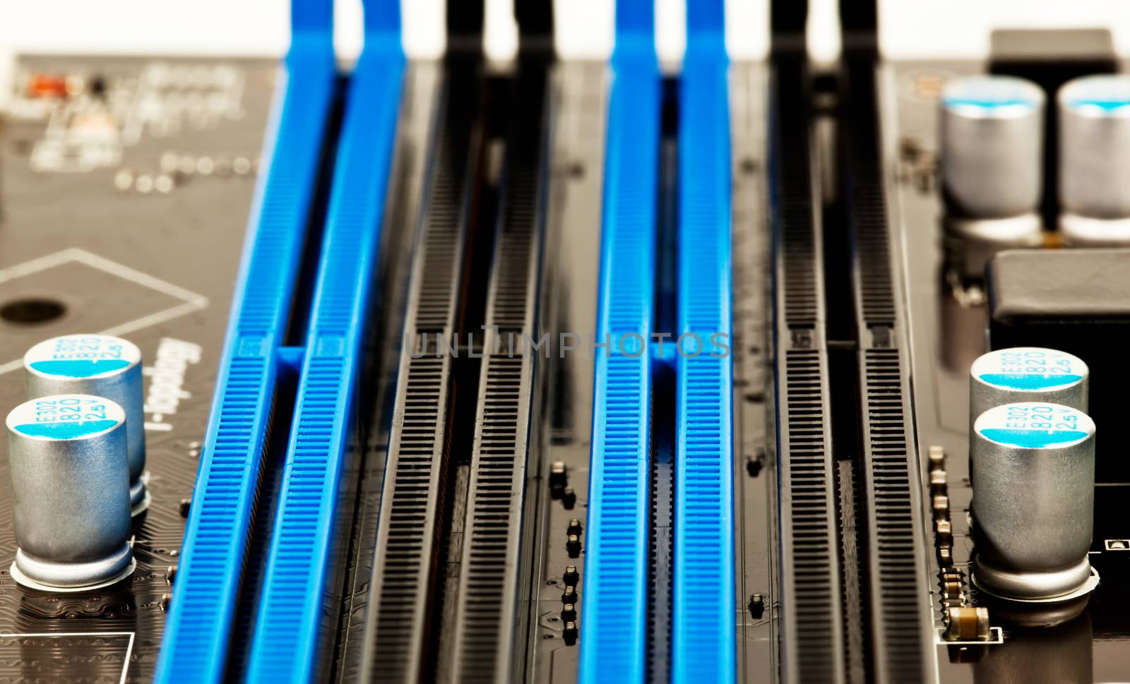 Laptop black and blue mother board parts closeup by RawGroup