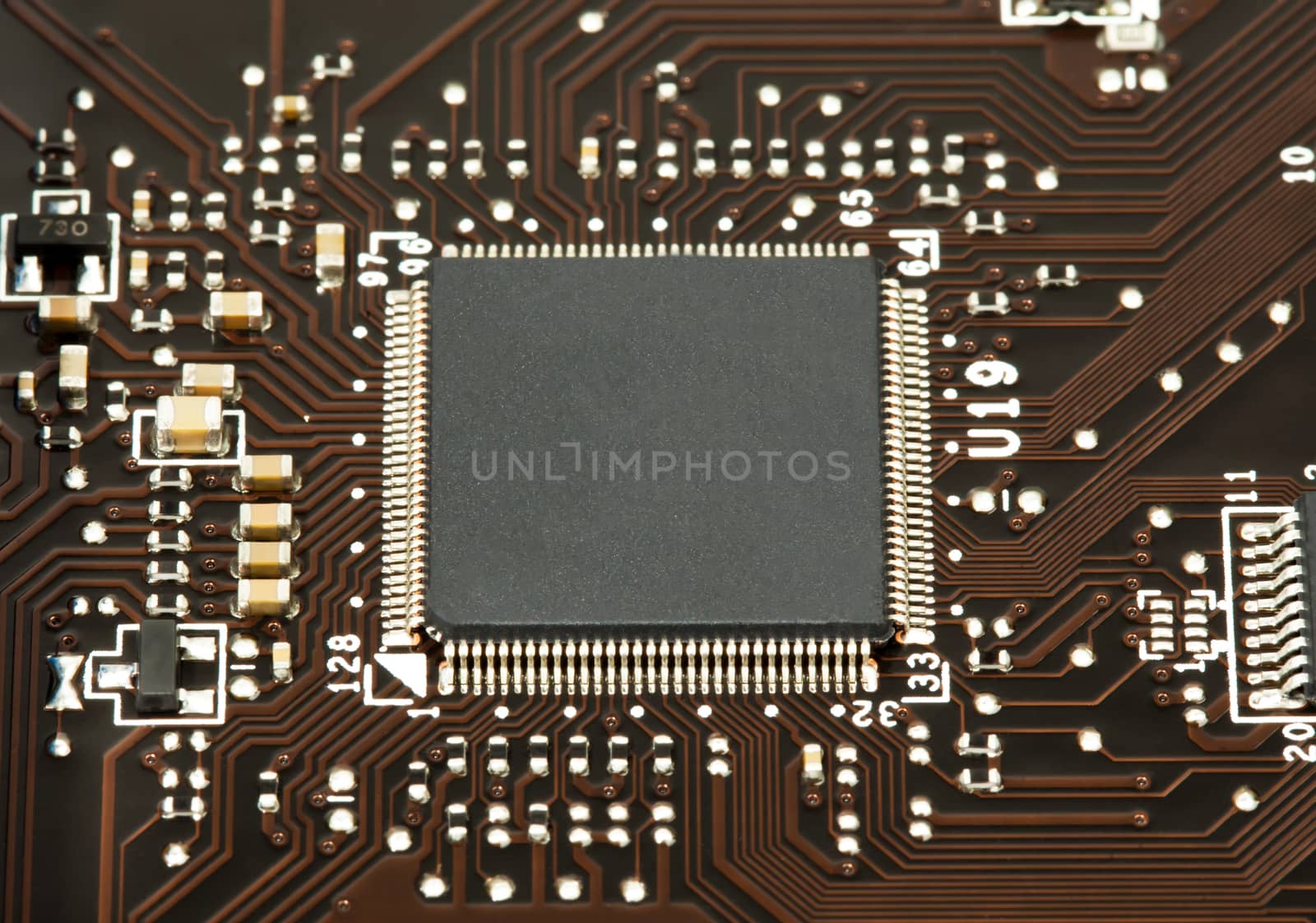 Laptop chip on mother board closeup by RawGroup