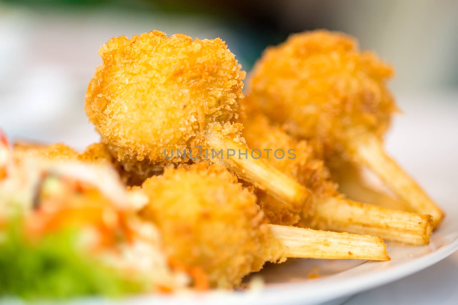 Sugar cane skewered fried minced shrimps or Chao tom - Vietnamese food