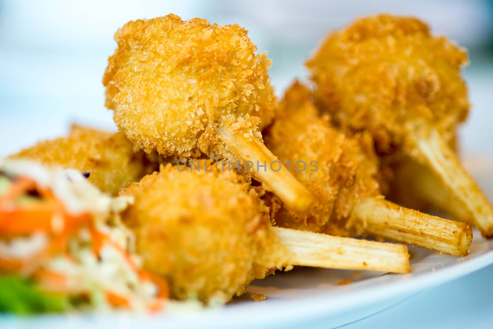 Sugar cane skewered fried minced shrimps or Chao tom - Vietnamese food