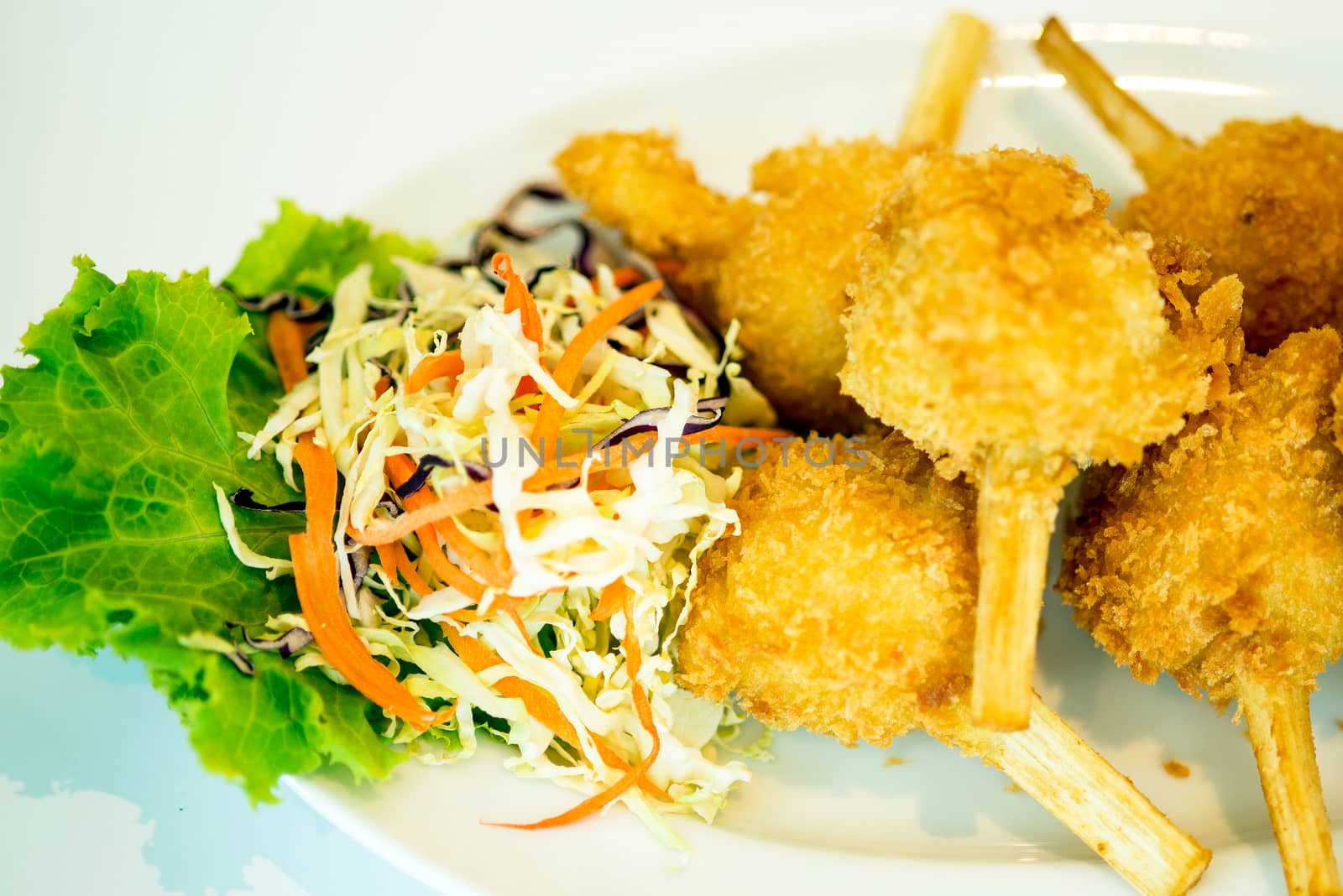 Sugar cane skewered fried minced shrimps or Chao tom by Yuri2012