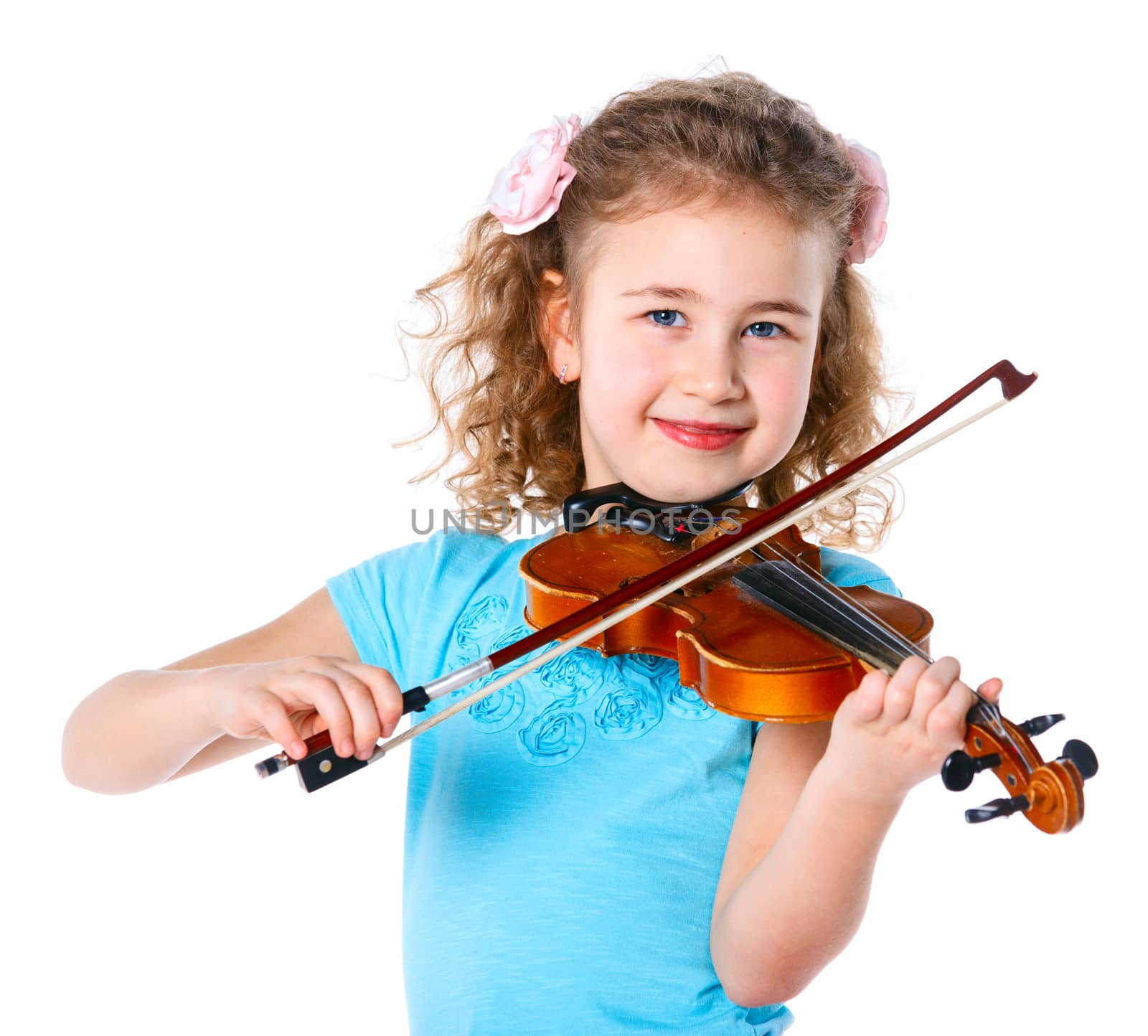 Little cute girl playing the violin isolated on white.