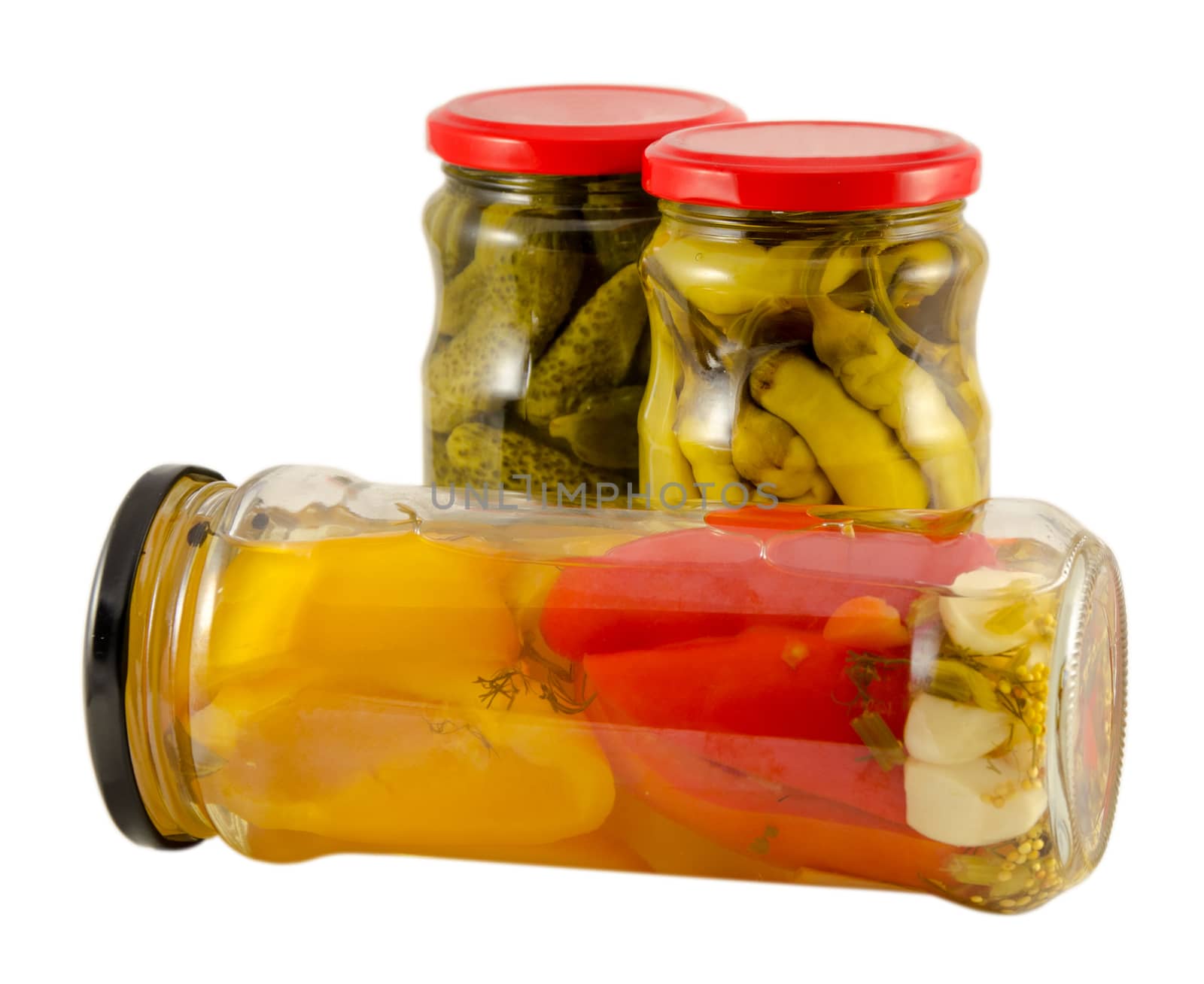 pickled jar hot red pepper and cucumber in vinegar isolated on white background