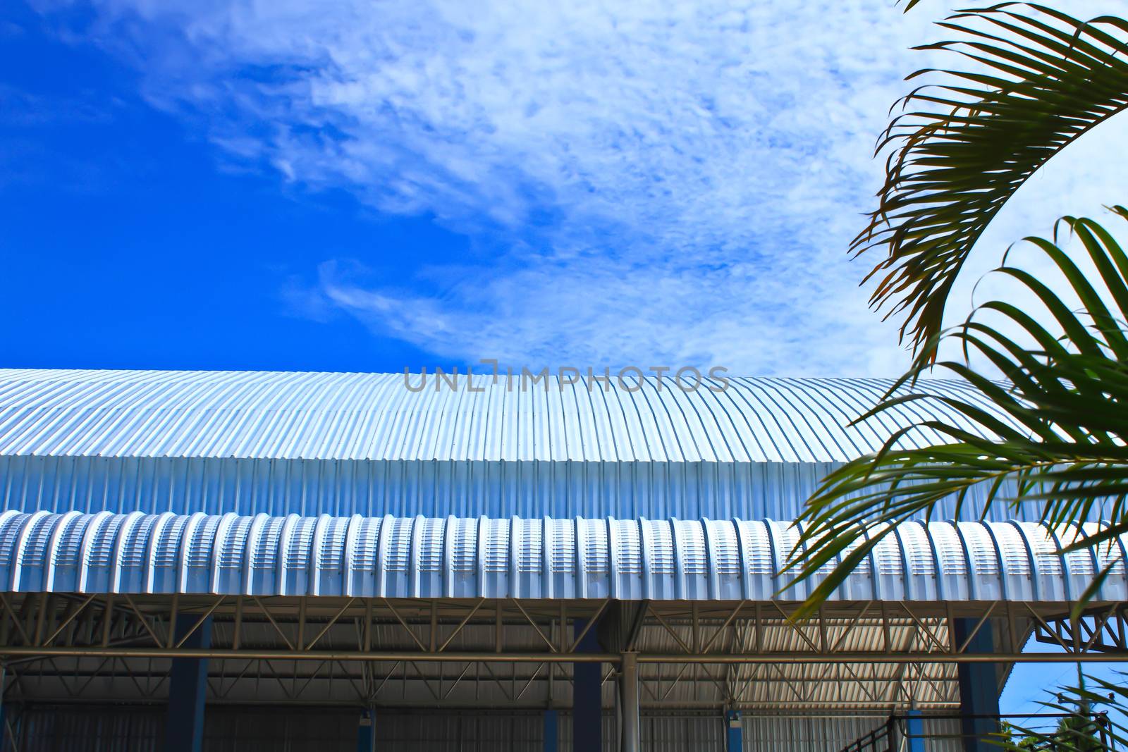 Metalic Facade, roof aluminium factory on blue sky