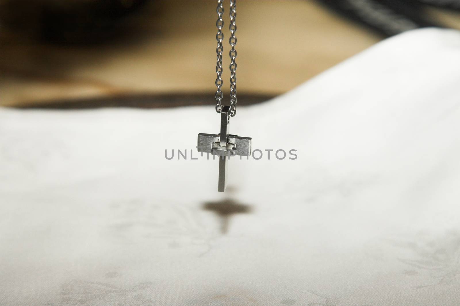 Piece of jewelery, silver cross on a chain