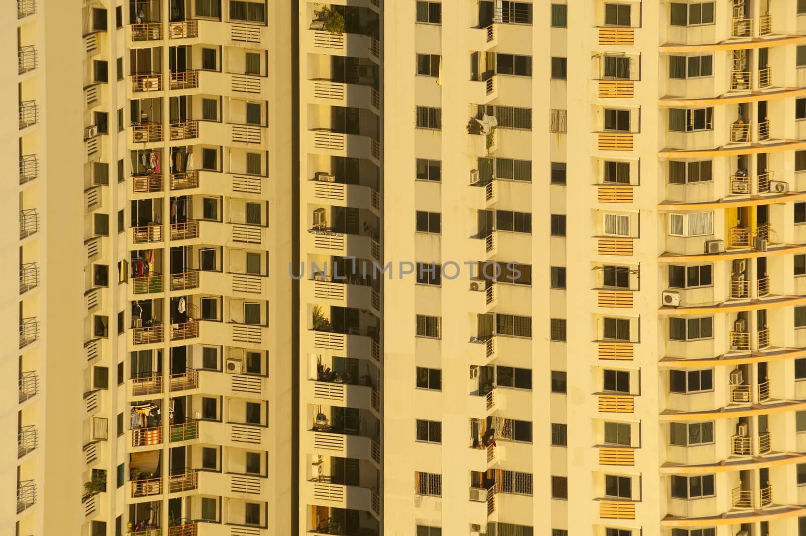 Condominium with sunset in Bangkok, Thailand. by think4photop