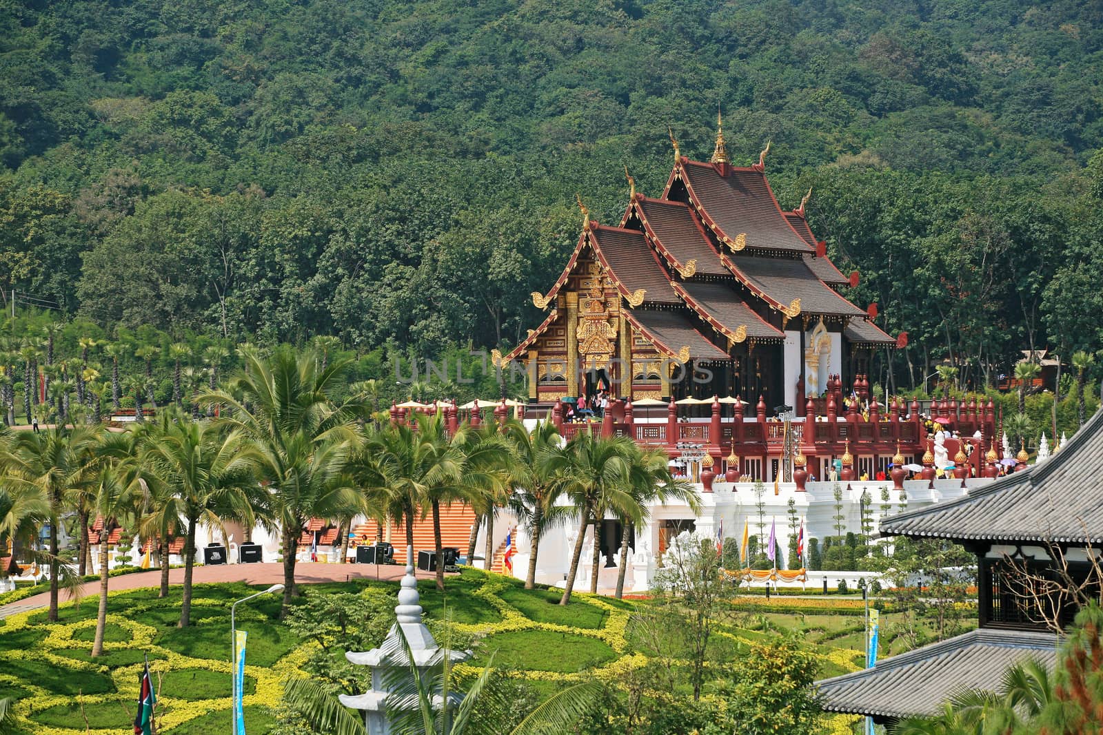 Traditional thai architecture in the Lanna style , Royal Pavilion (Ho Kum Luang) at Royal Flora Expo, Chiang Mai, Thailand
