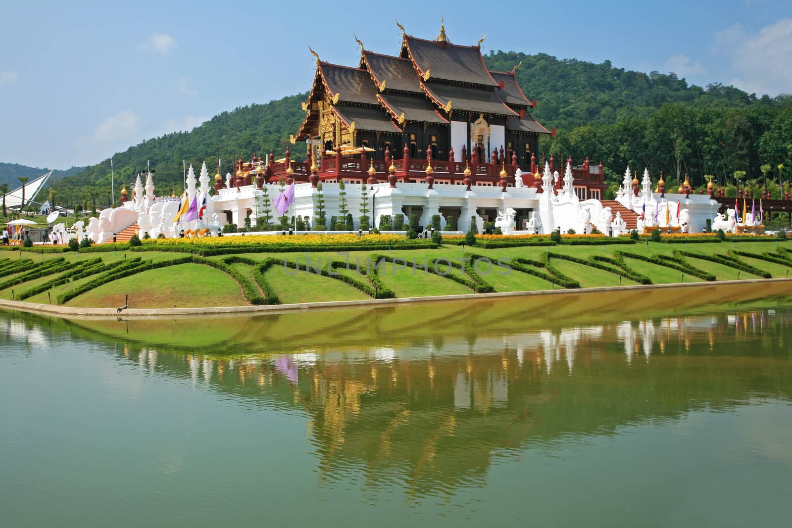 Traditional thai architecture in the Lanna style , Royal Pavilion (Ho Kum Luang) at Royal Flora Expo, Chiang Mai, Thailand