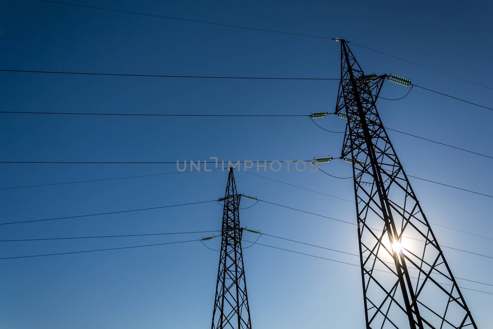 High-voltage electricity pylons, view from below