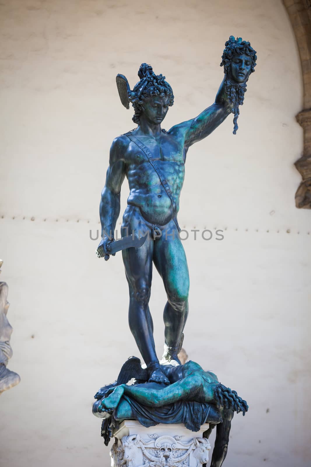 Perseus holding head of Medusa, bronze statue by Benvenuto Cellini in Loggia de Lanzi, Piazza della Signoria, Florence, Italy