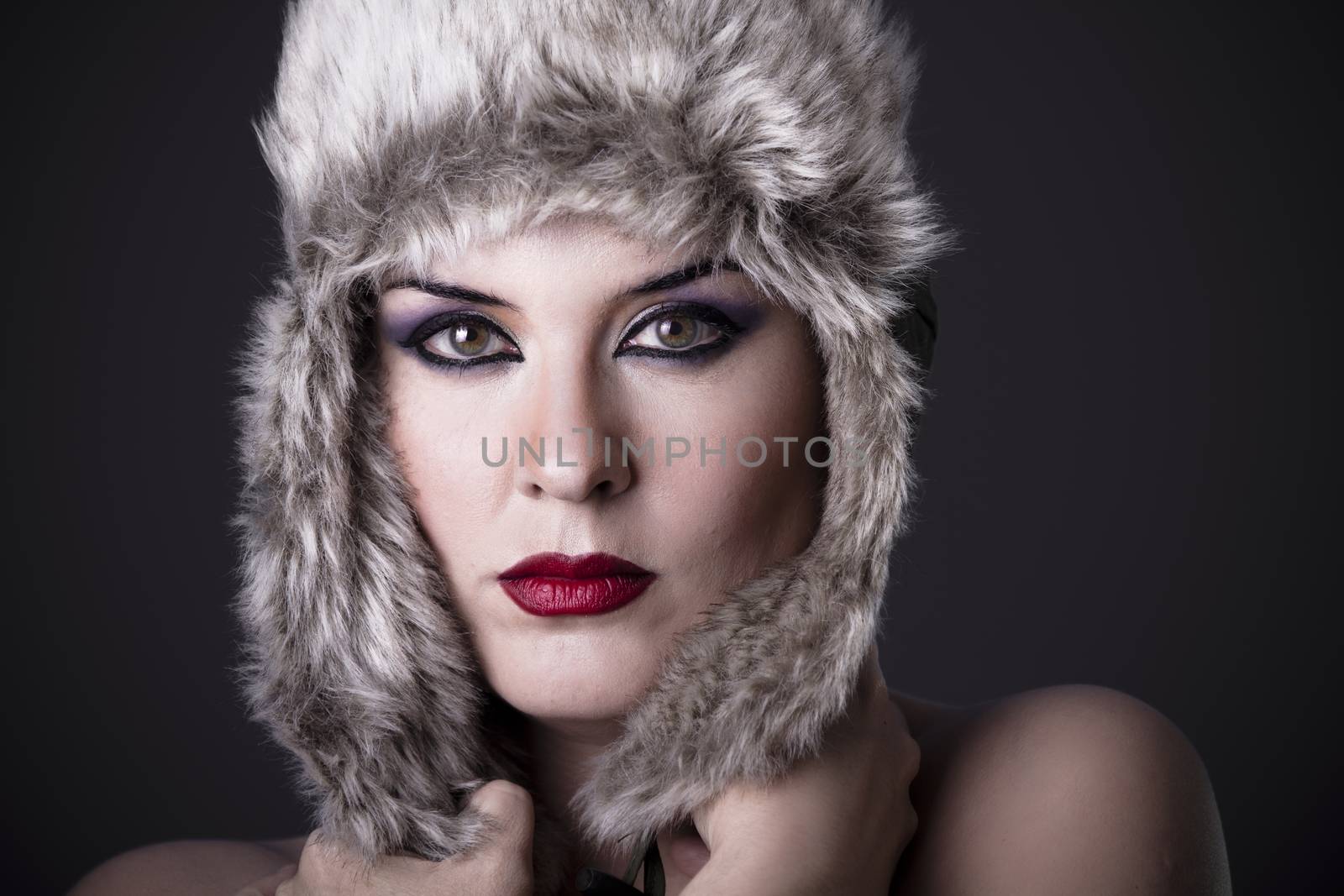 Russian Girl with hat on a dark background