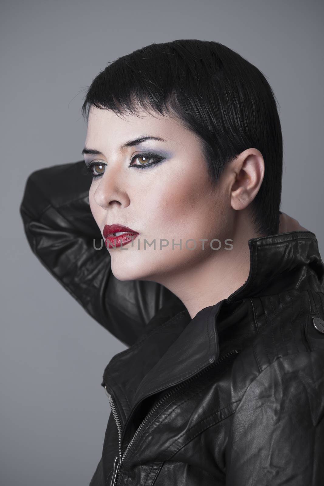 Sexy woman with black leather jacket in his pride hurt women by FernandoCortes