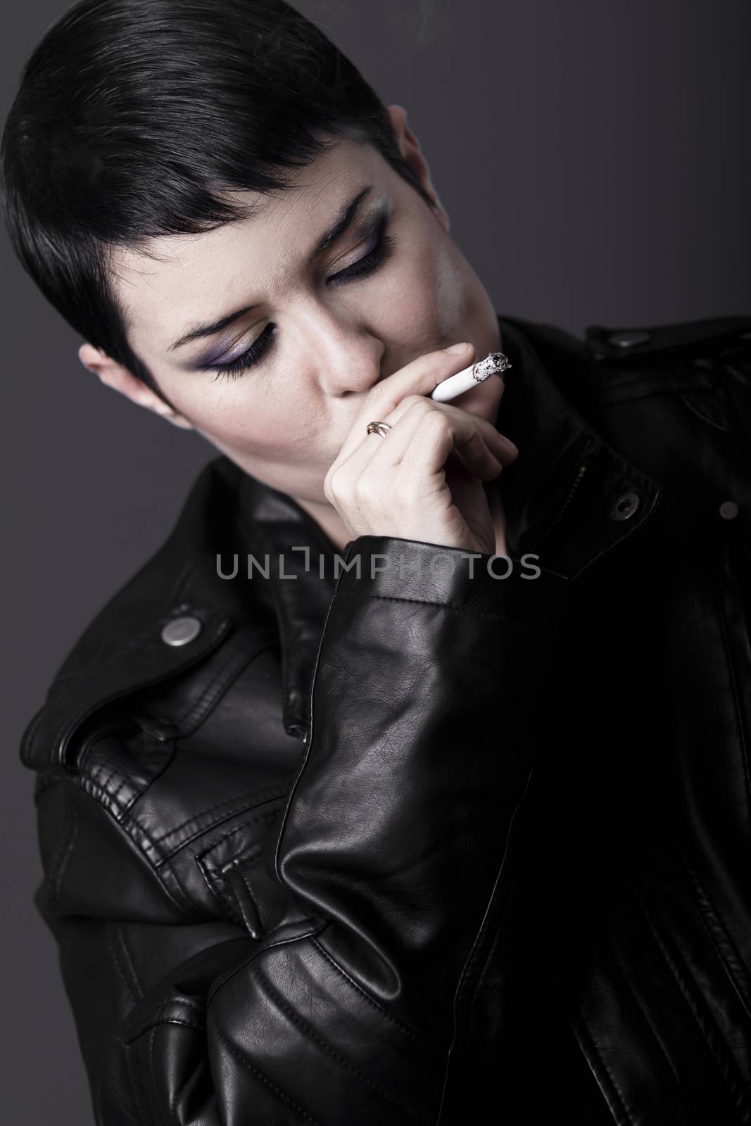 Woman smoking a cigarette by FernandoCortes
