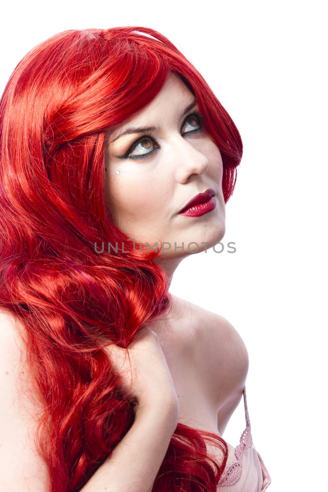 Cute and beautiful girl with wavy red hair caressing his cheek by FernandoCortes