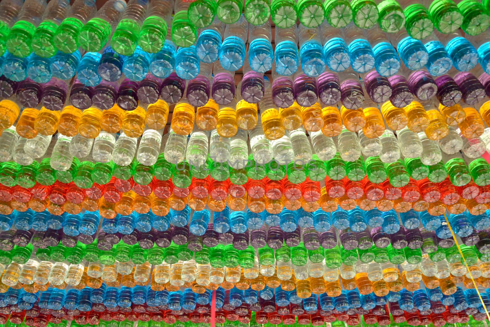 used plastic colorful bottles decorated by think4photop