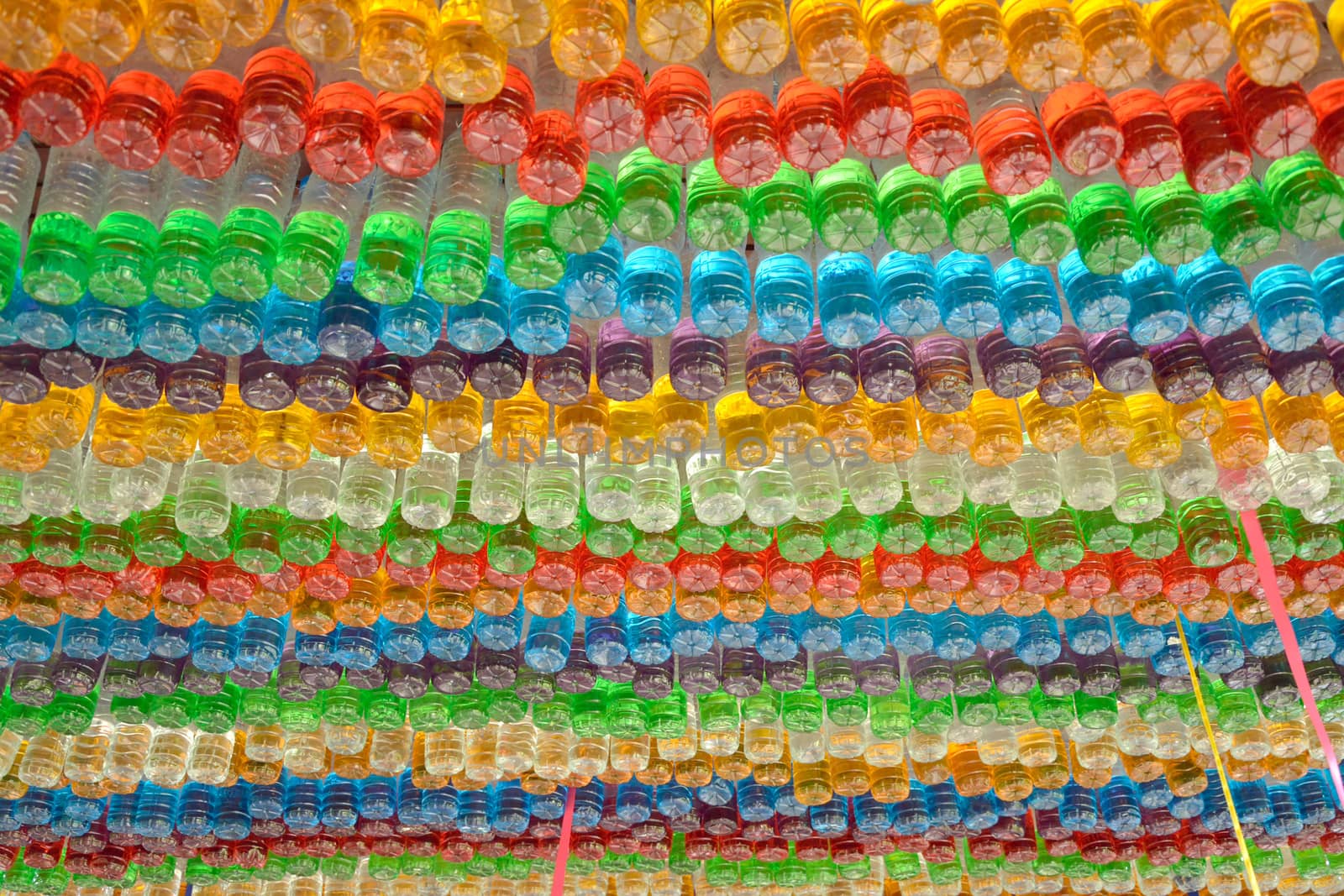 used plastic colorful bottles decorated by think4photop