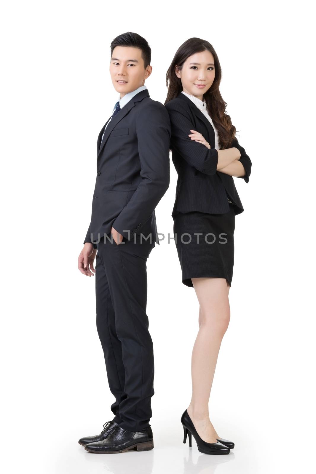 Confident Asian business man and woman, full length portrait isolated on white background.