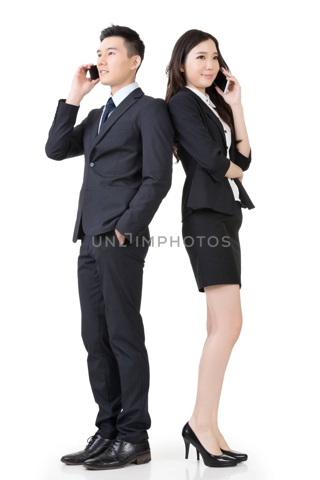 Asian business man and woman take a call by elwynn