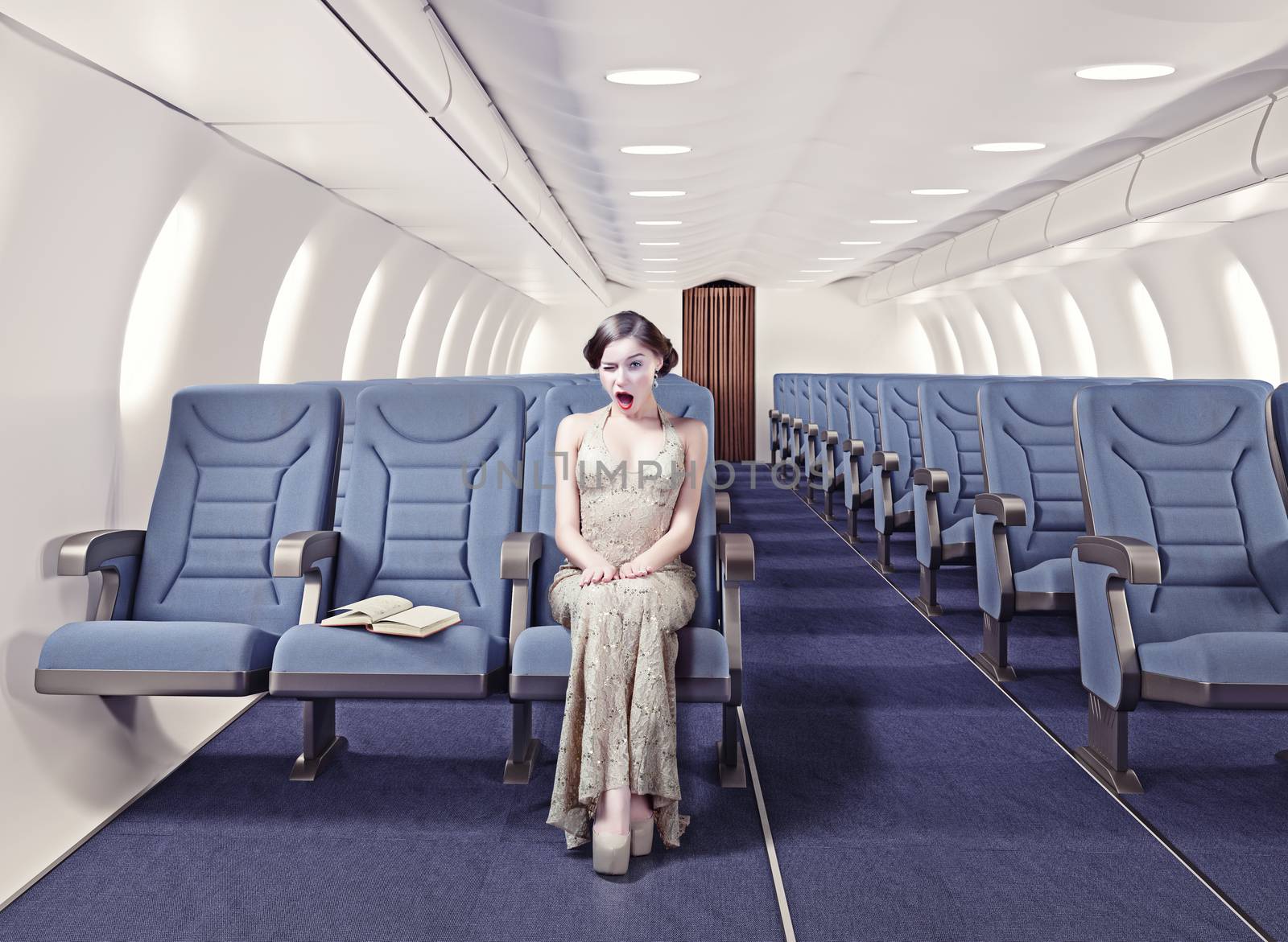 Surprised girl in an airplane. Creative concept