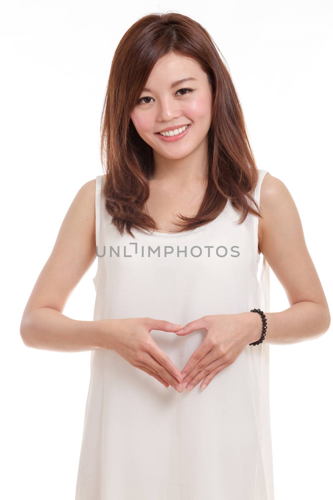 Woman in white with hands in shape of a heart by imagesbykenny