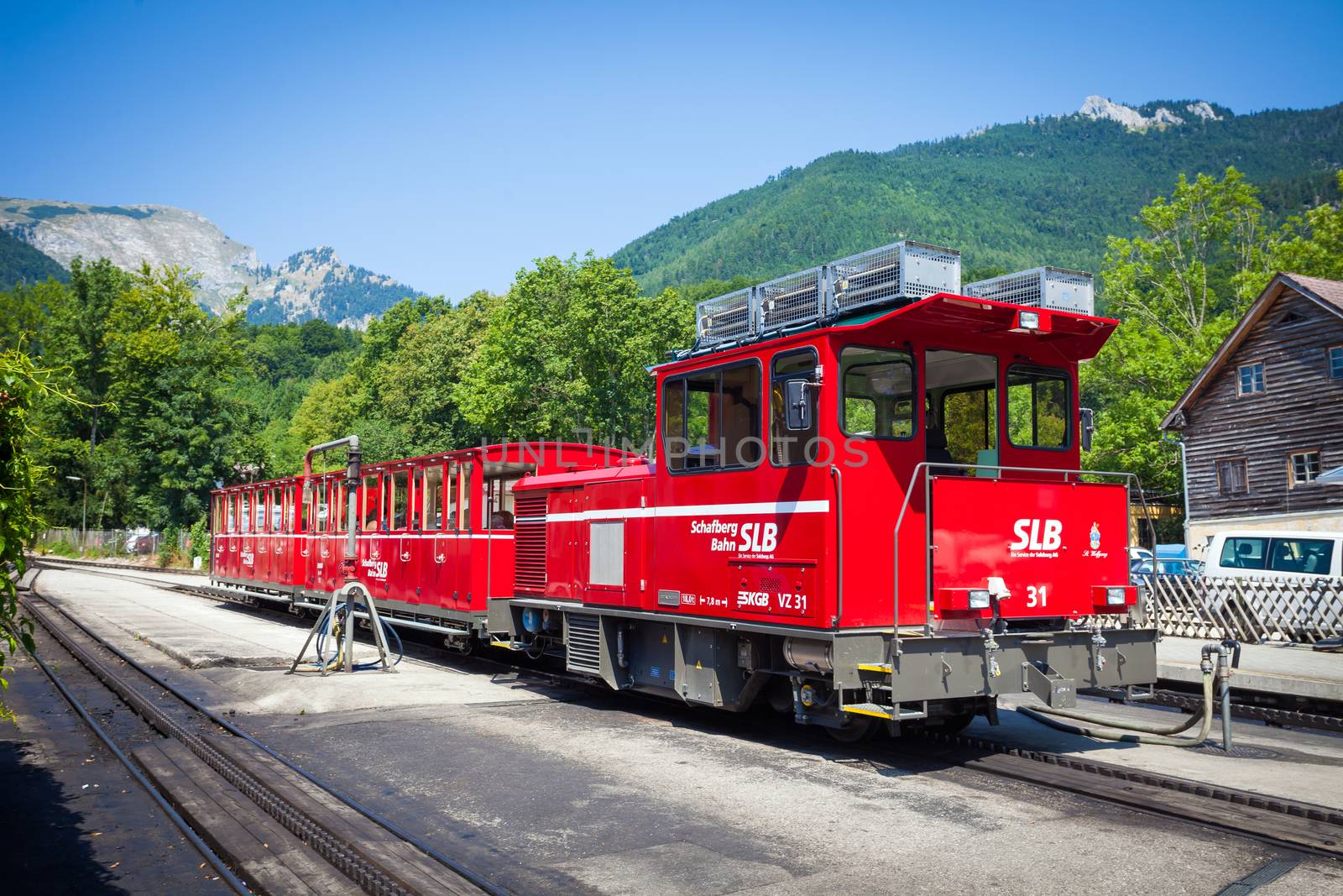 ST. WOLFGANG, AUSTRIA - AUGUST 6: Diesel locomotive of a vintage cogwheel railway going to Schafberg Peak (1783m) on August 6, 2013 in St. Wolfgang.