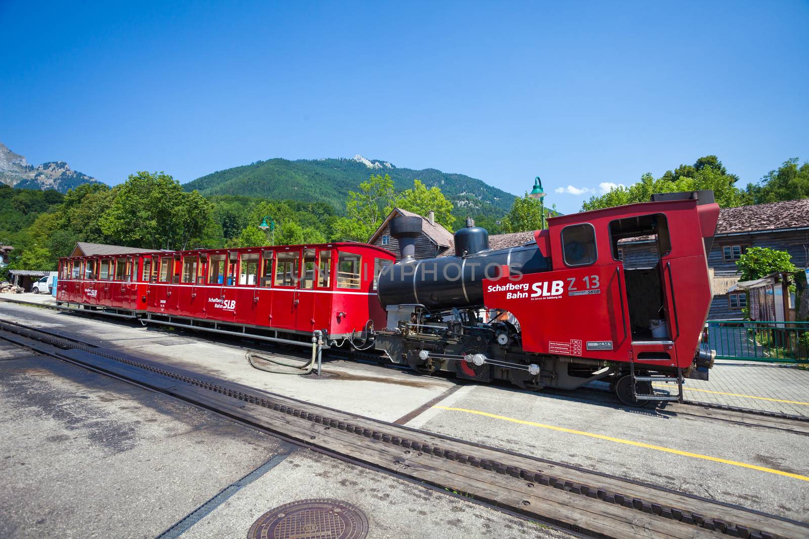 ST. WOLFGANG, AUSTRIA - AUGUST 6: Steam locomotive of a vintage cogwheel railway going to Schafberg Peak (1783m) on August 6, 2013 in St. Wolfgang.