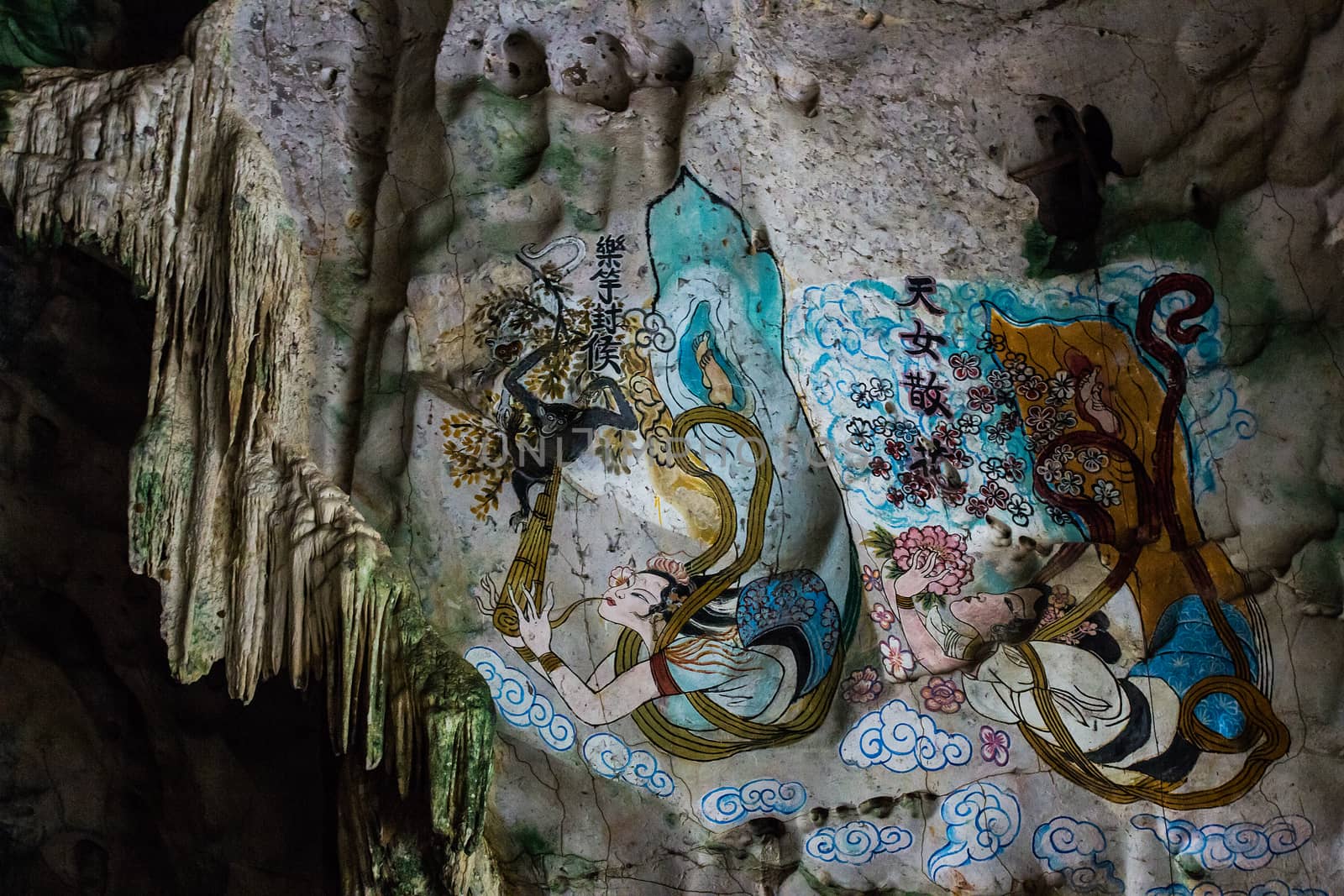 Painting of chinese girls on the walls in the cave look like an  by kannapon