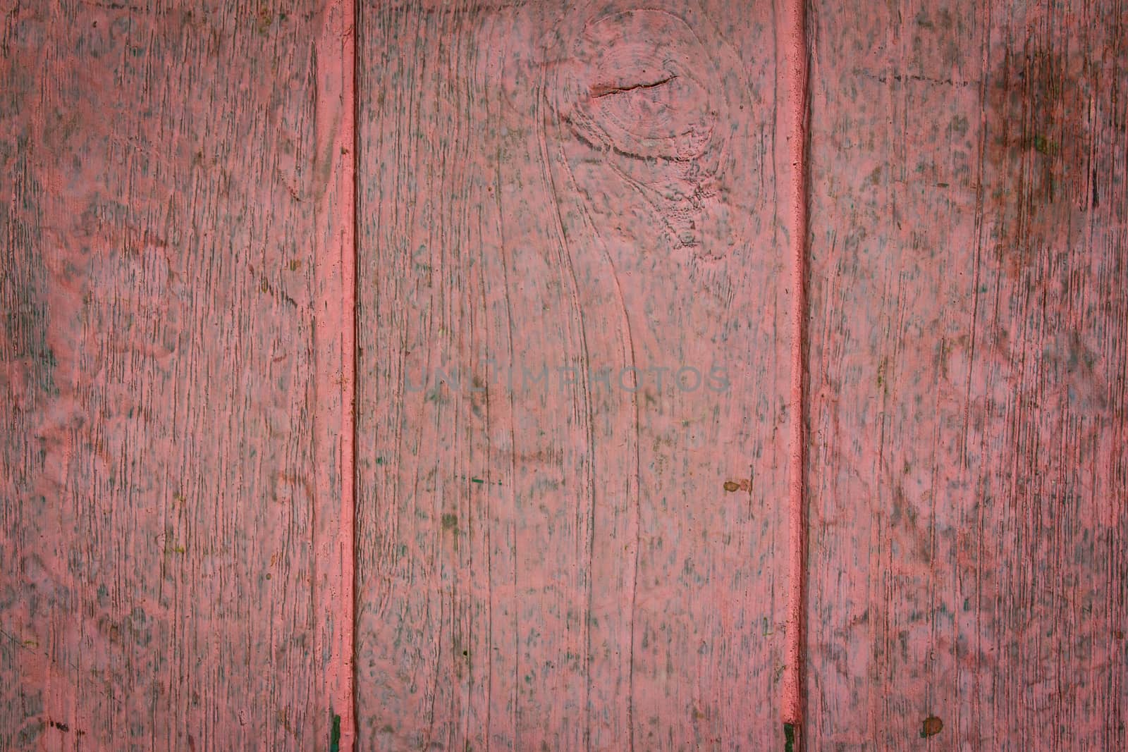 The pink texture of the door wood