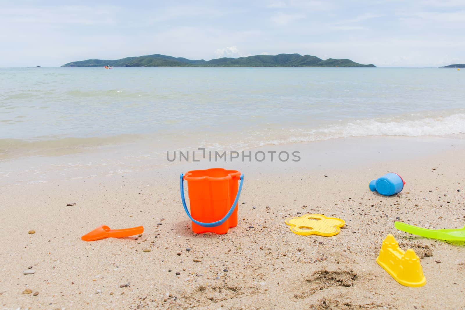 toys for childrens sandboxes against the sea and the beach