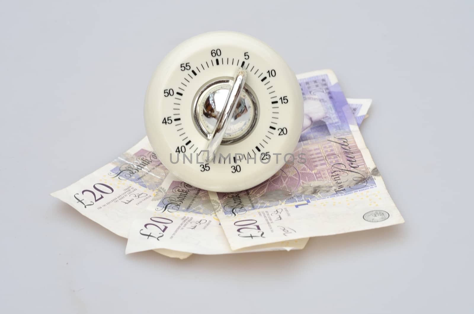 Timer over banknotes