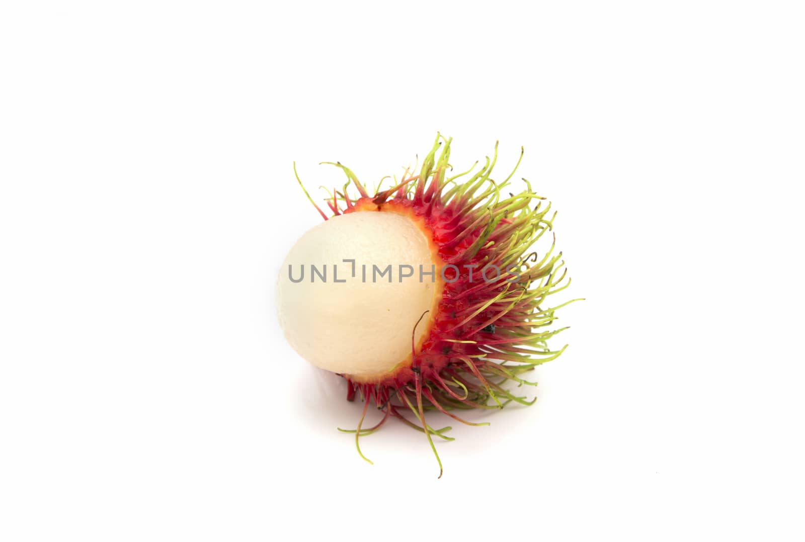 Rambutan fruit with red shell  on white background