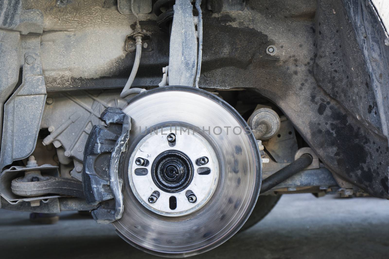 Closeup car disc brakes servicing  by Sorapop