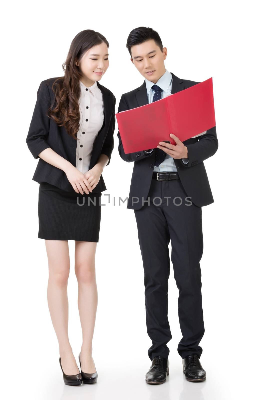Asian business man and woman discussing, full length portrait isolated on white background.