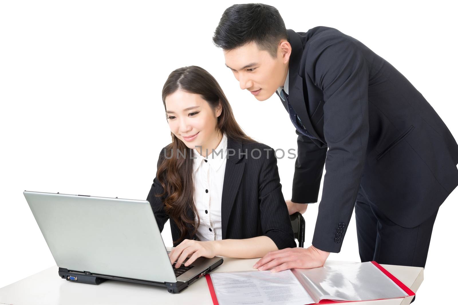 Confident young businessman and businesswoman discussion their work, closeup portrait on white background.