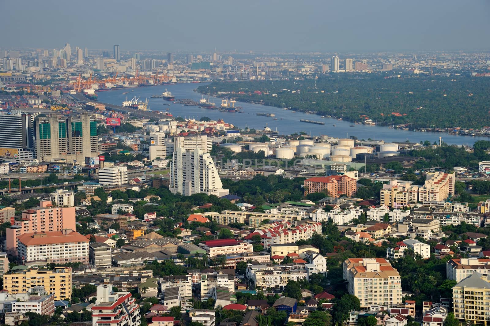 Bangkok city and Chaophraya River from bird's-eye view in evening.