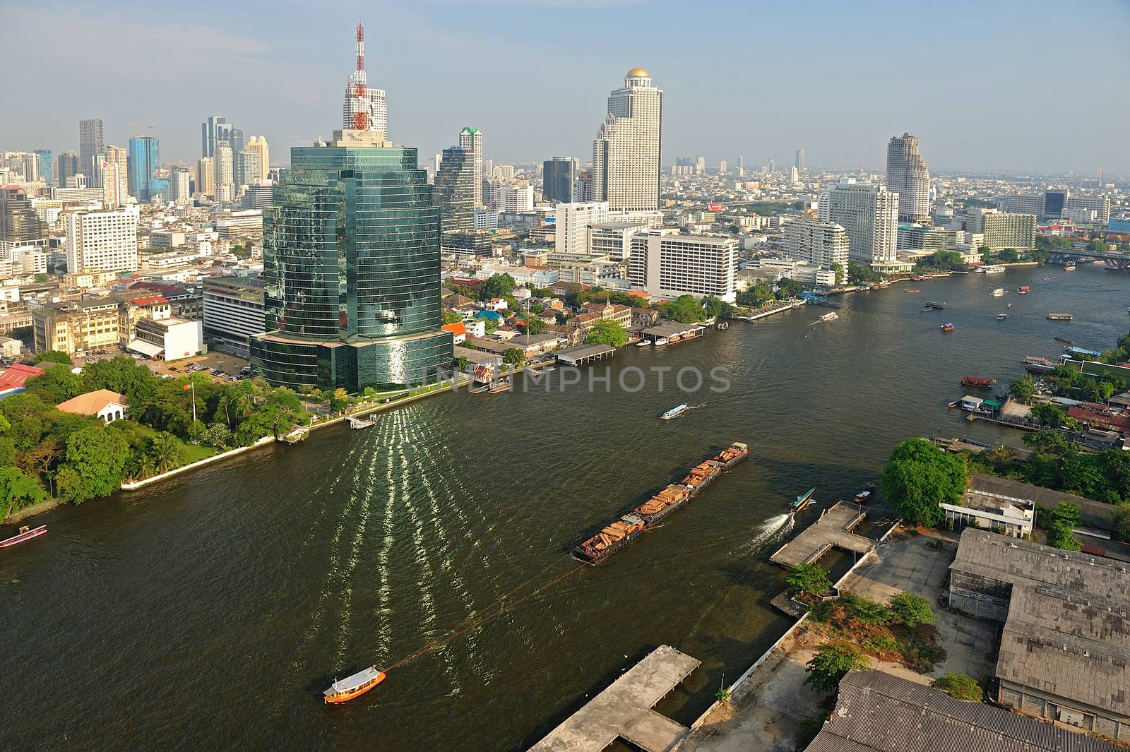 Aerial view of Bangkok with Chao Phraya river, Thailand. by think4photop