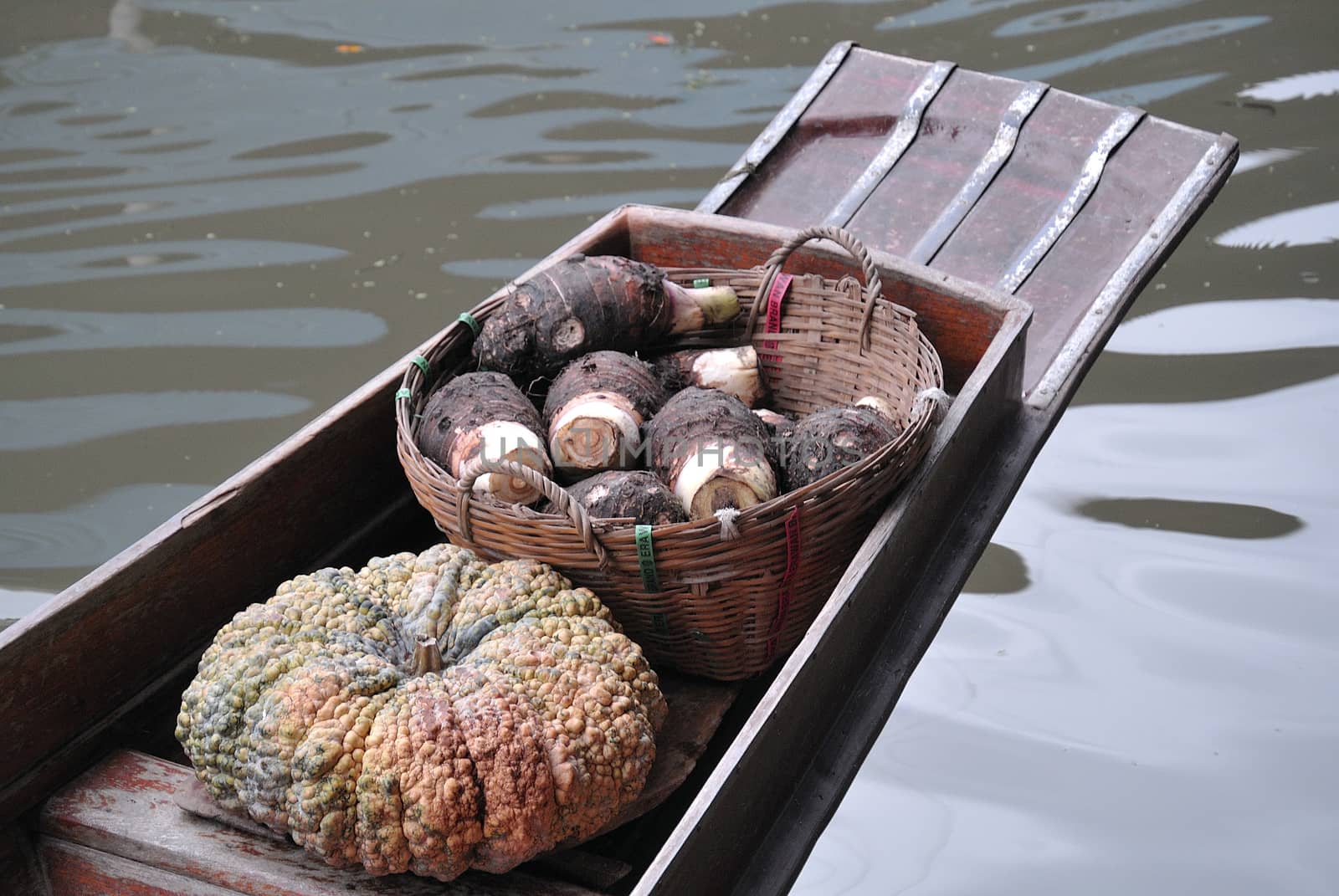 pumkin and taro in traditional floating market , Thailand. by think4photop