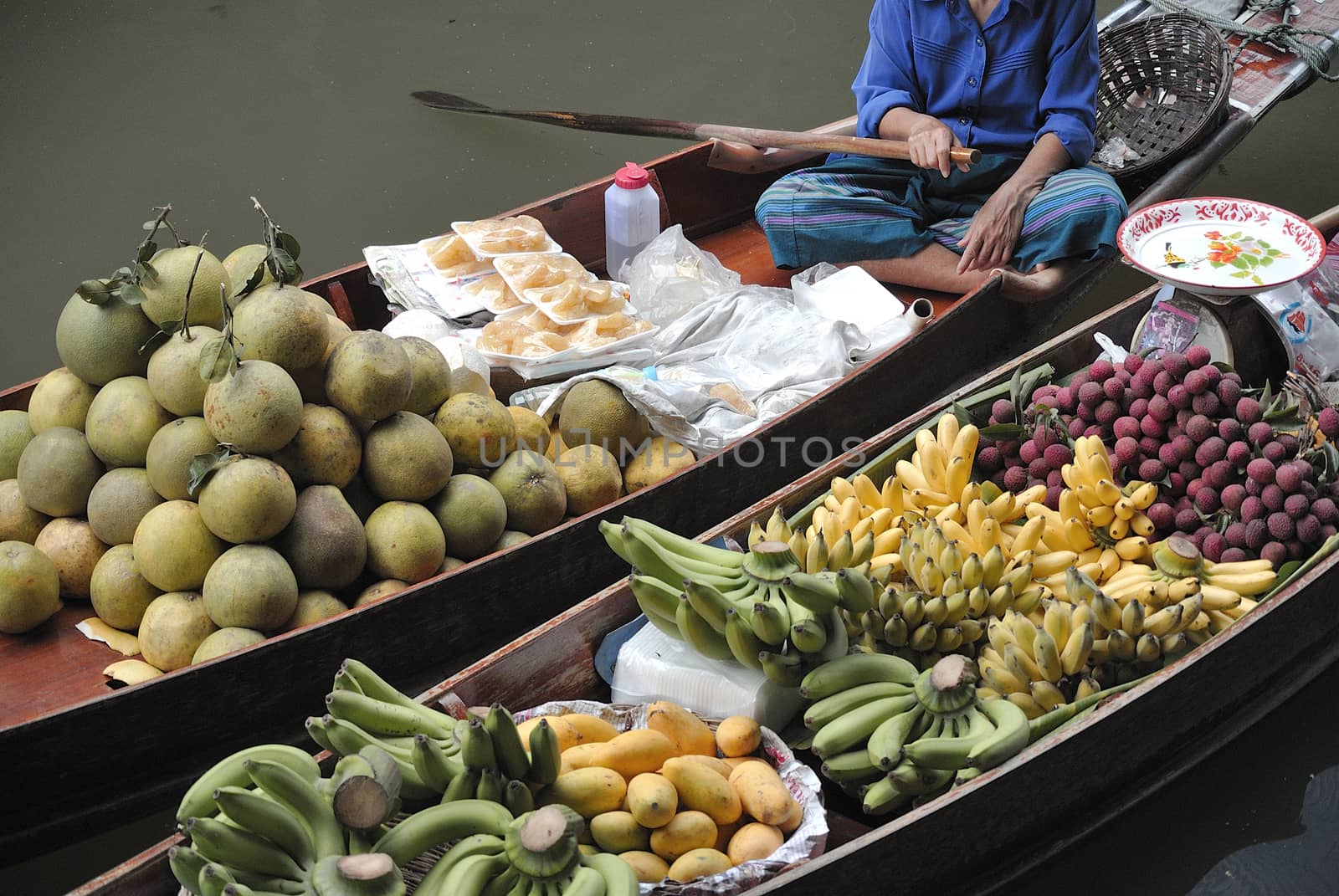 fruits in traditional floating market , Thailand.