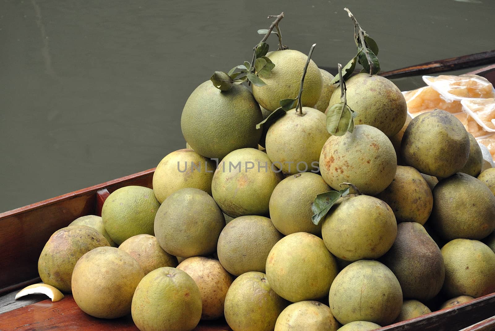 fruits in traditional floating market , Thailand. by think4photop