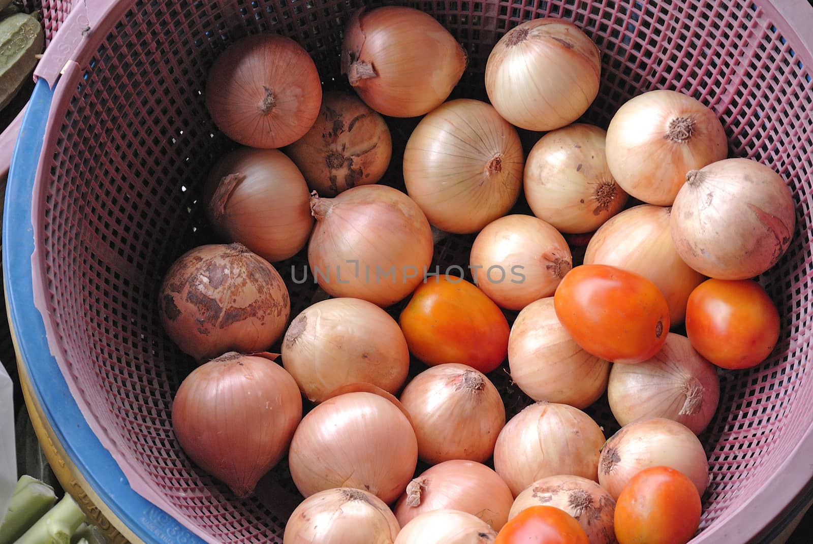 Onion in traditional floating market , Thailand. by think4photop