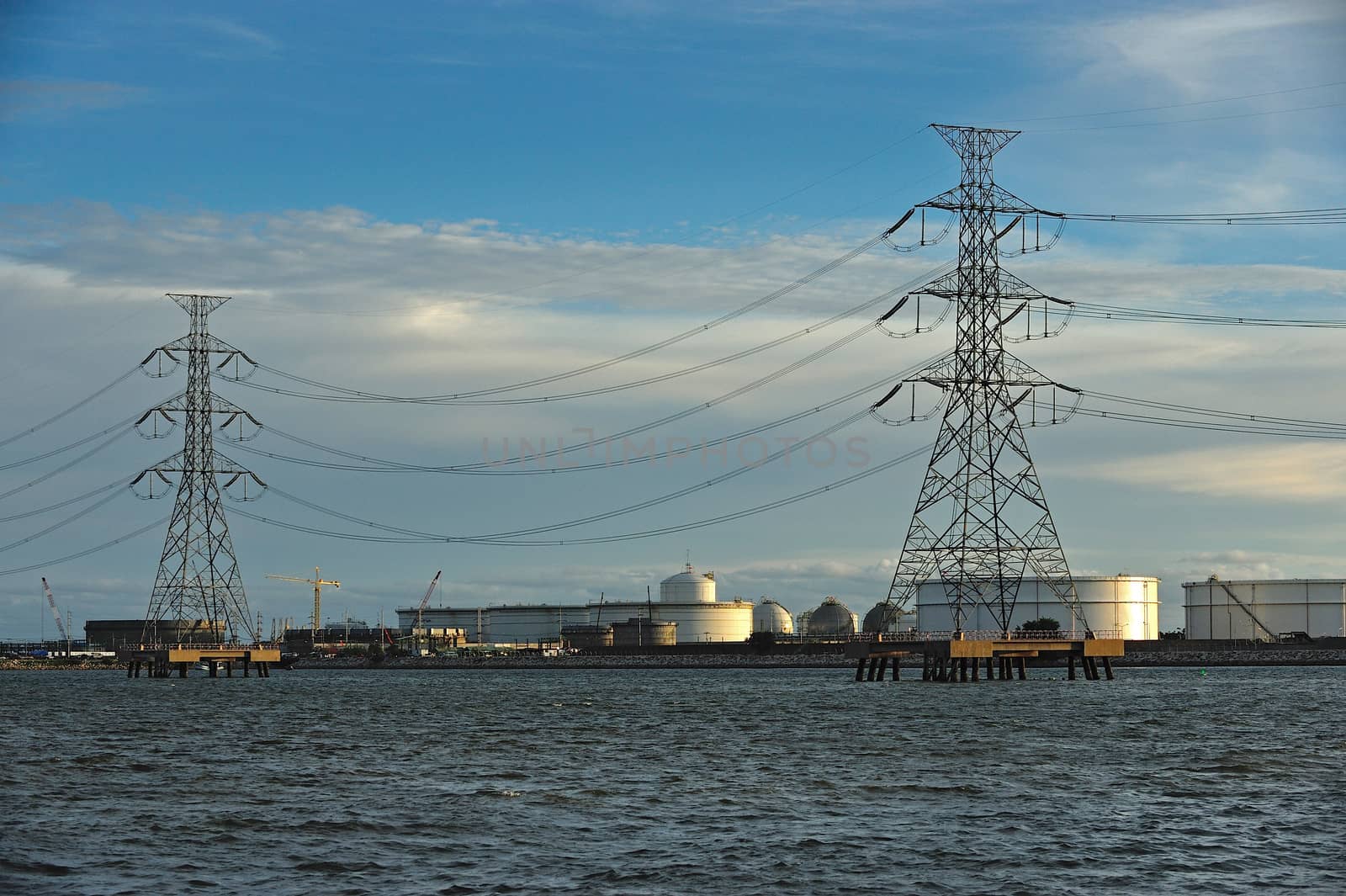 industrial power plant in the sea. by think4photop