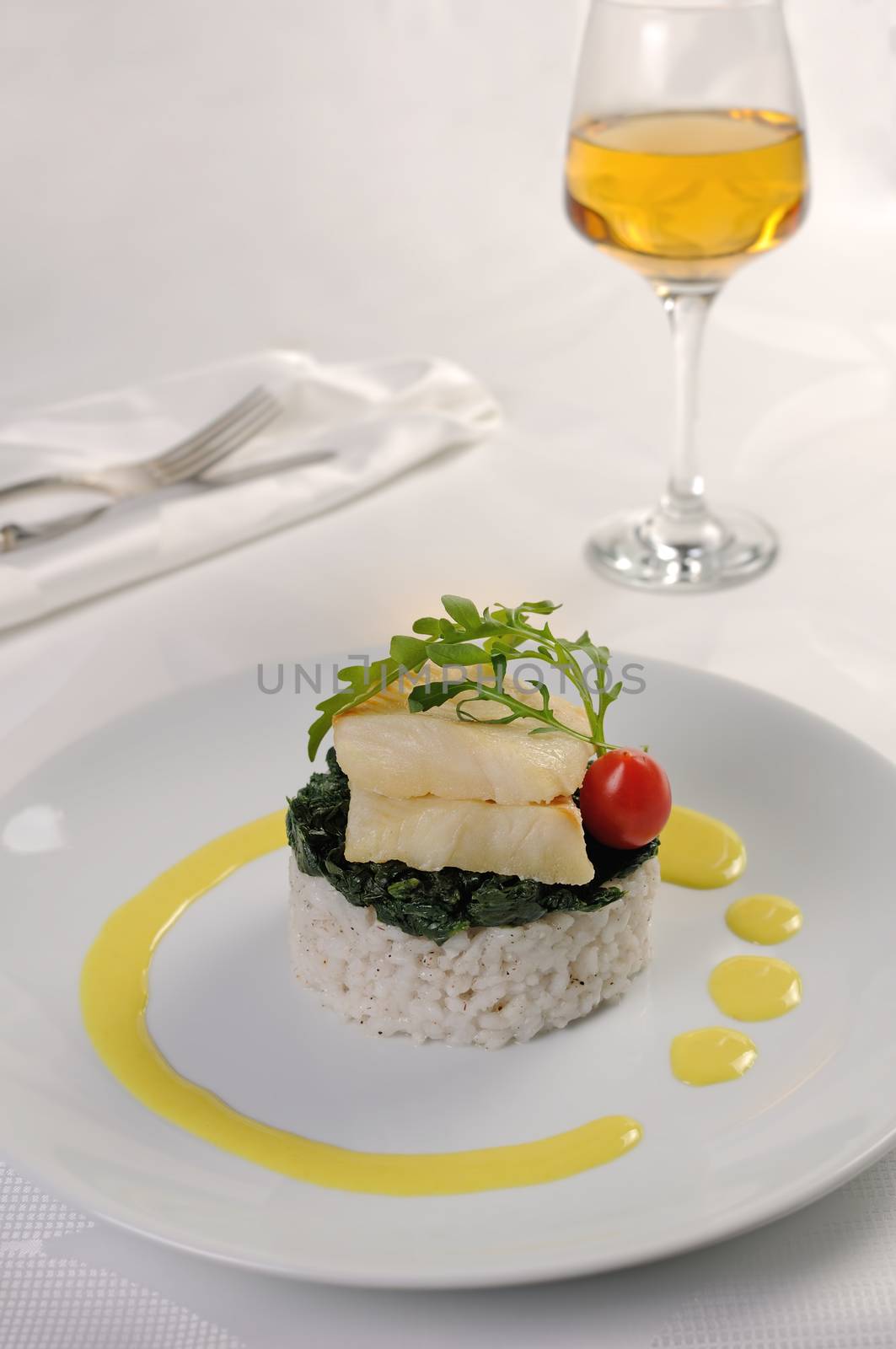 Flounder fillets with risotto and spinach by Apolonia