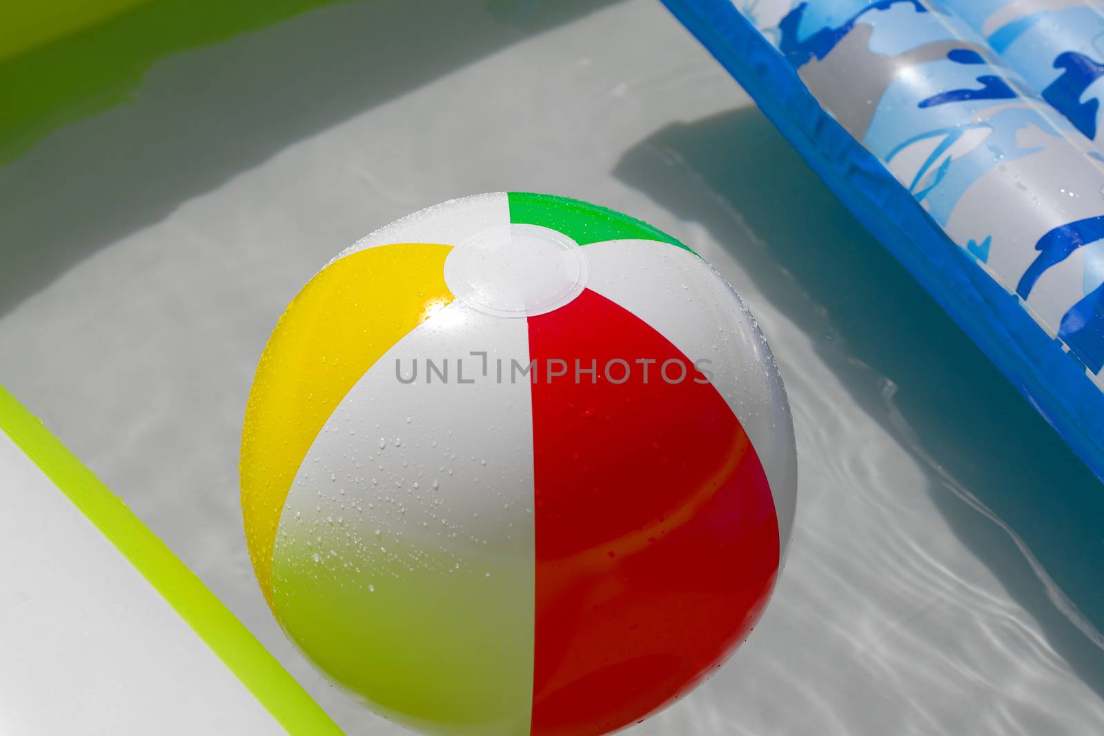 Rubber ball in a swimming pool