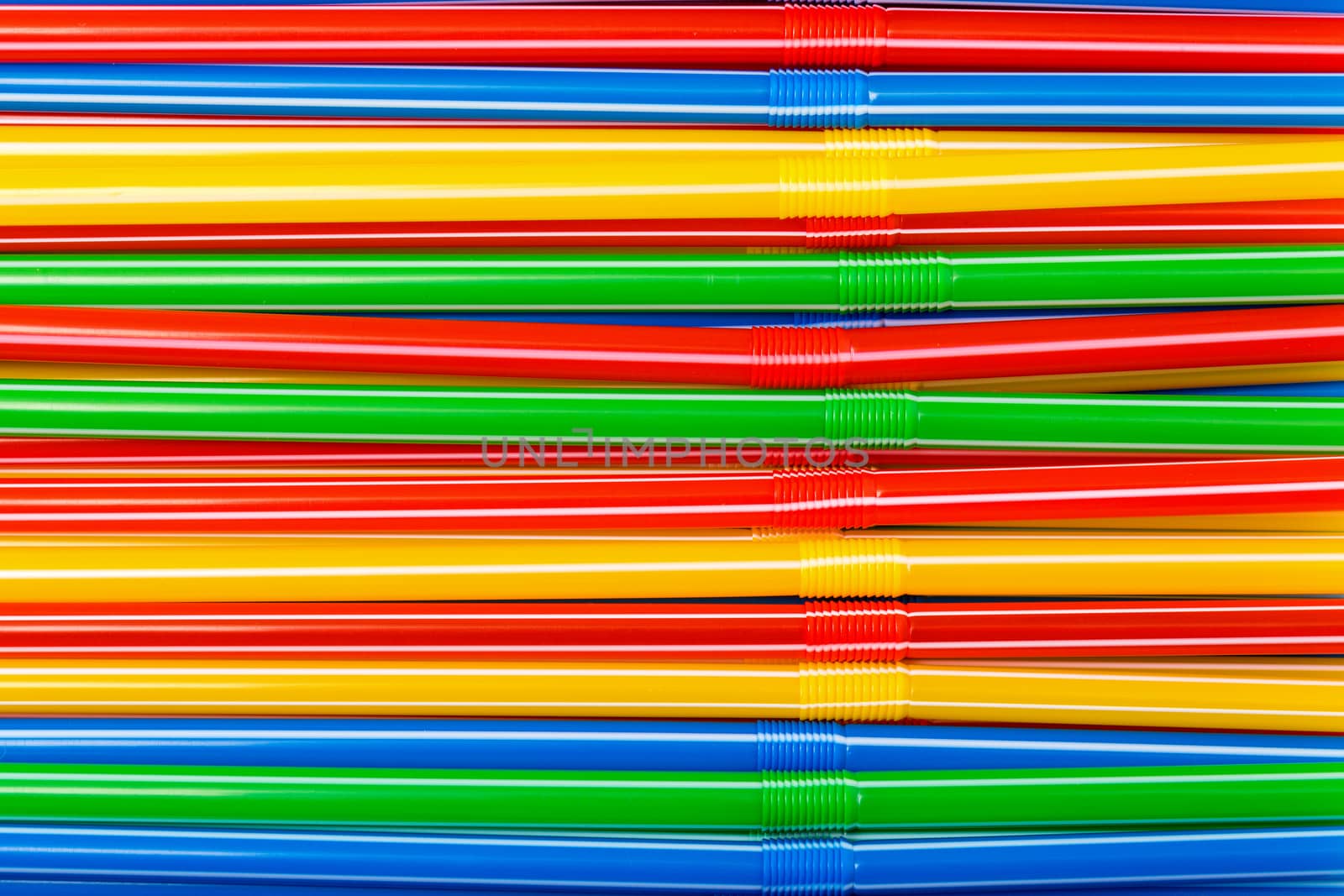 Background of Colored Plastic Drinking Straws, closeup