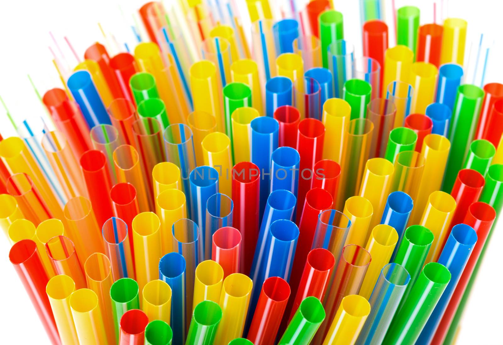 Colored Plastic Drinking Straws on a white background